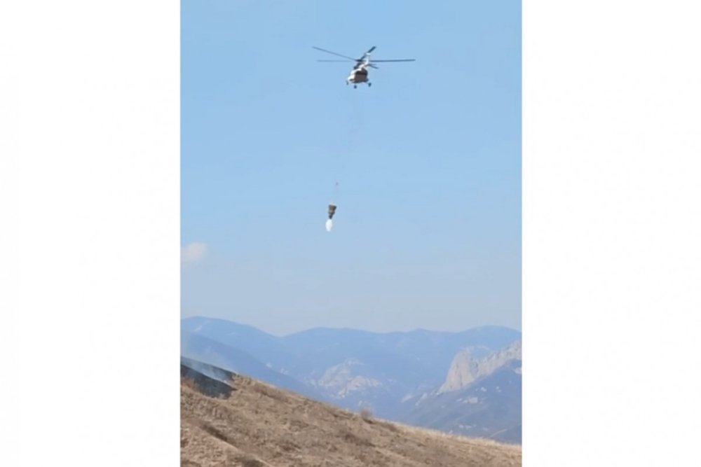 Kelbecer ve Lacindaki yanginin sondurulmesi ucun helikopterler celb olundu